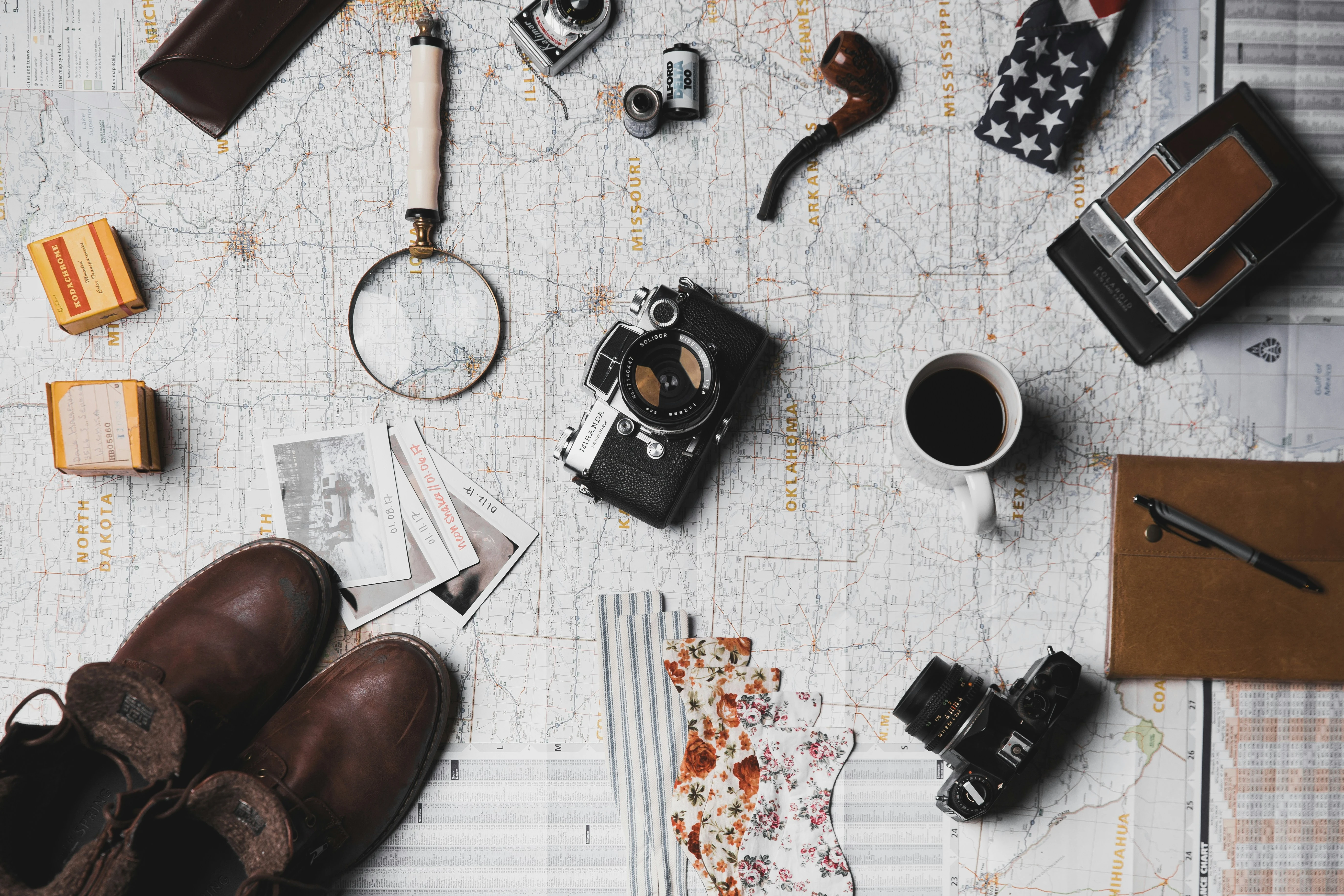 Traveler planning a journey with a map